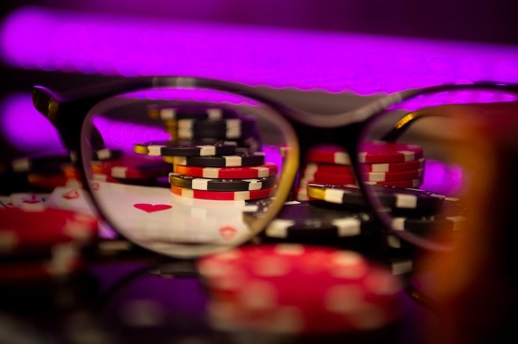 Live casino studio with multiple table cameras and professional dealers